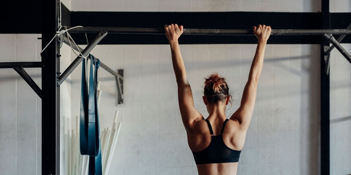 woman doing a pull up