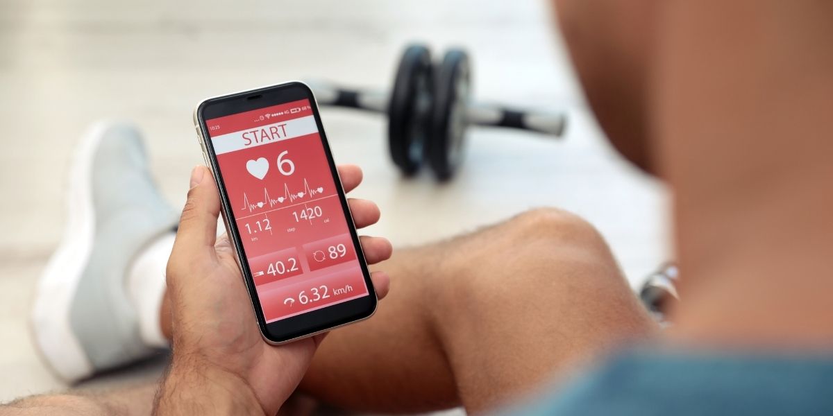 man looking at a fitness app